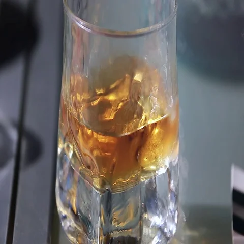 Glass of Whiskey Close Up Stock Footage 69432427