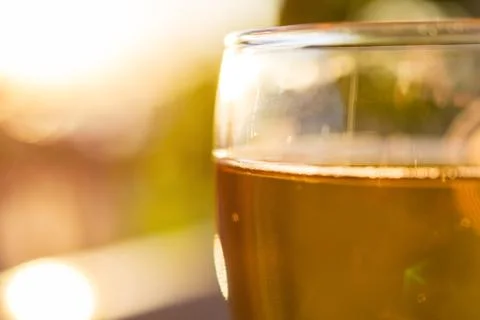 Glass Of White Wine On Blurred Background Close-Up Stock Photos