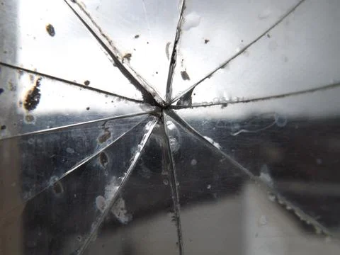 A glass window broken into segments Stock Photos