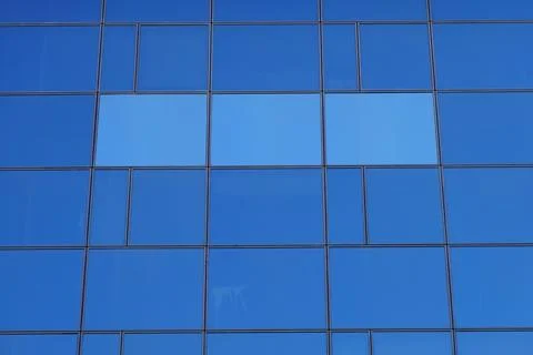 Glass windows rectangular shapes pattern on modern office building facade 스톡 사진