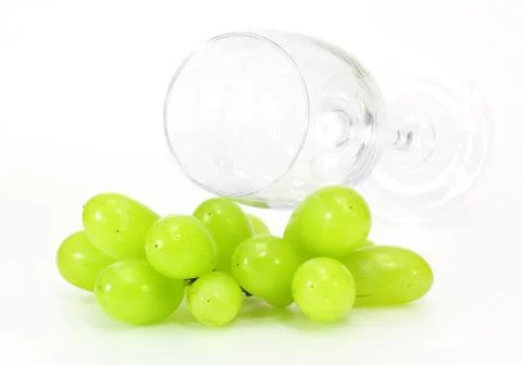 Glass of wine and grape Stock Photos