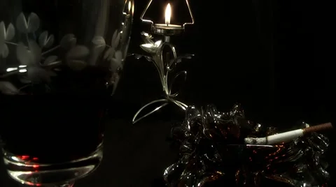 A glass of wine on the background of candles Stock Footage 11134644