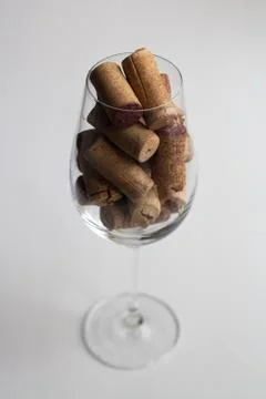 Glass with wine corks Stock Photos