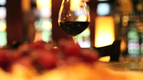 Glass of wine with raisin Stock Footage