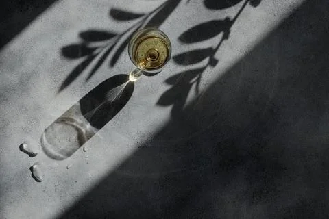 Glass of wine with shadows Foto stock