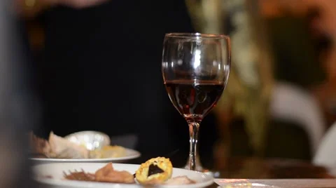 Glass of Wine on Table Stock Footage 68151899