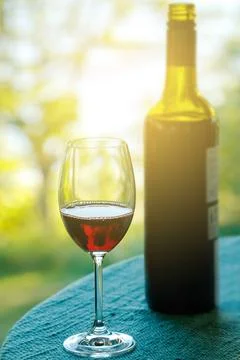 Glass of wine on the table Stock Photos