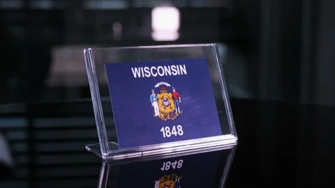 Glass Wisconsin Flag Rotating On Table Video stock 208471646
