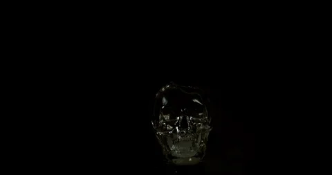 Glass wodka skeleton surrounded in fire  4K 1000FPS Video stock 90707199