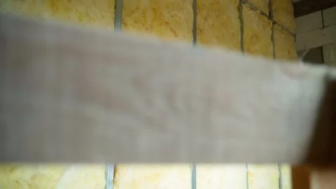 Glass wool between galvanized metal profiles. Frame light partition from U Stock Footage 237419259
