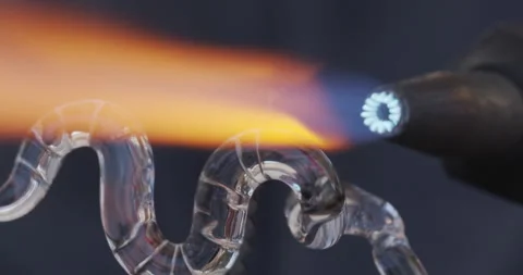 Glass work with flame. Slow motion, close up. Stock Footage 203704614