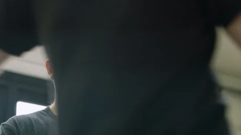 Glassblower putting molten glass on molded glass Stock Footage 107891353