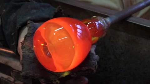 Glassblowing and a worker doing his job Stock Footage 239655853