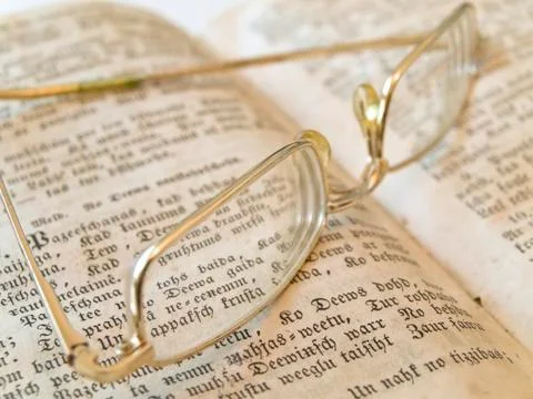 Glasse on Open Book Stock Photos