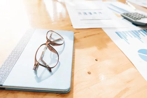 Glasses and Book on work table, Relax Concept Stock Photos