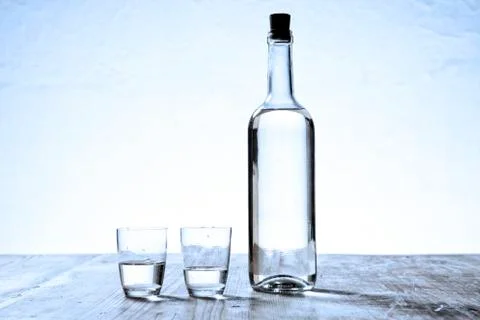 Glasses and bottle Stock Photos