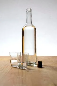 Glasses and bottle Stock Photos