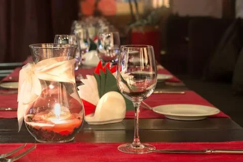 Glasses and a candle Stock Photos