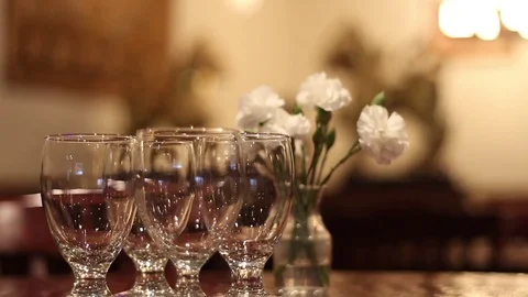 Glasses and flowers Stock Footage