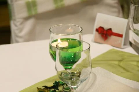Glasses and plates on table Stock Photos