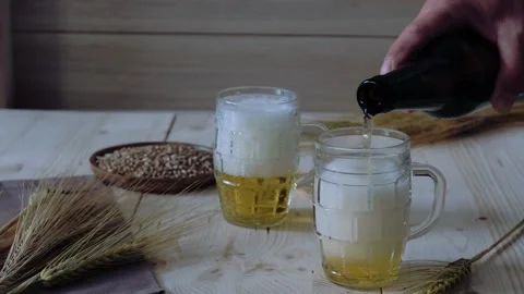 Glasses with beer on the table Stock Footage 201211745