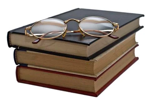 Glasses on the book. Stock Photos