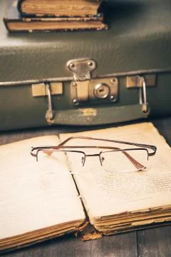 Glasses on the book Stock Photos