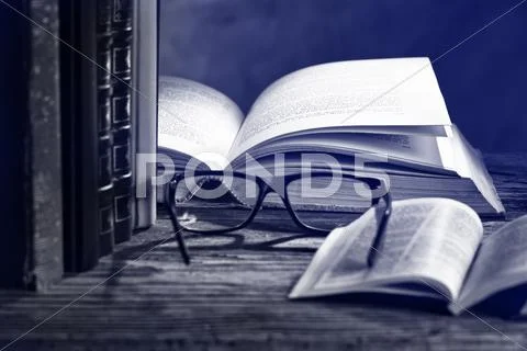 Glasses with books Stock Photos