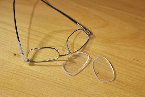Glasses broken on the floor Stock Photos