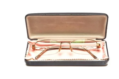 Glasses in a case on a light background. Stock Photos