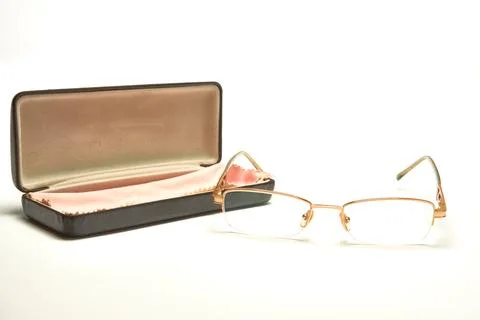 Glasses in a case on a light background. Stock Photos