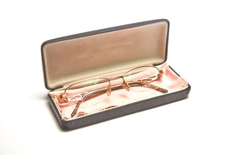 Glasses in a case on a light background. Stock Photos