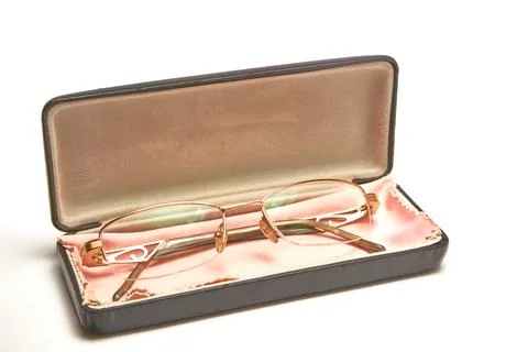 Glasses in a case on a light background. Stock Photos