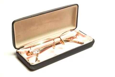 Glasses in a case on a light background. Stock Photos