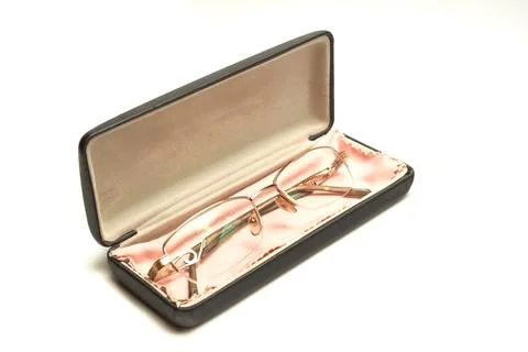 Glasses in a case on a light background. Stock Photos