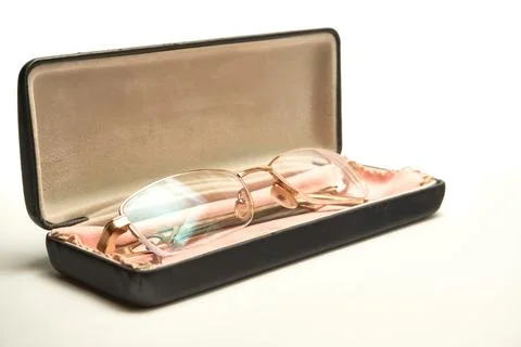 Glasses in a case on a light background. Stock Photos