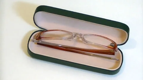  	Glasses in a case on a white background Video stock 58849661