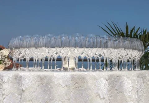 Glasses on a catering setting table Stock Photos