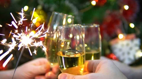 Glasses of champagne on the background of the Christmas tree Stock Footage 101540958