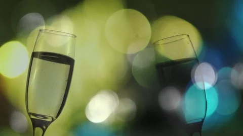Glasses of champagne with bokeh effect, background Stock Footage 80278615