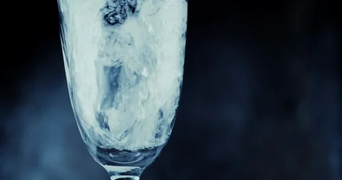 Glasses with champagne bubbles on dark background Stock-Footage 87319225