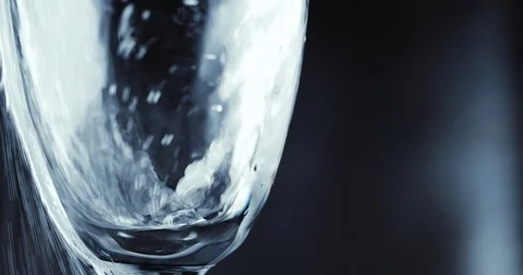 Glasses with champagne bubbles on dark background Stock Footage 87319708