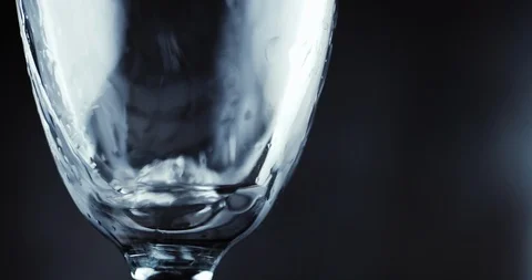 Glasses with champagne bubbles on dark background Video stock 87319937