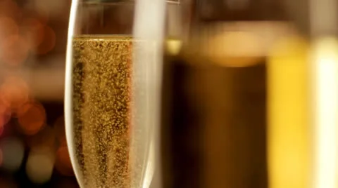 Glasses of Champagne rack focus Stock Footage 23024947