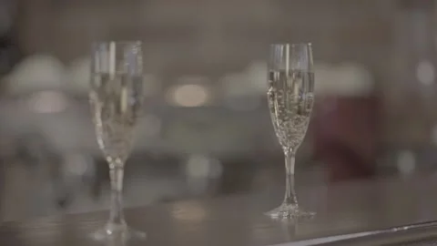 Glasses of champagne Slow motion Stock Footage 239375791