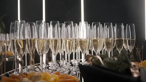 Glasses of Champagne - slow motion Stock Footage 260316874
