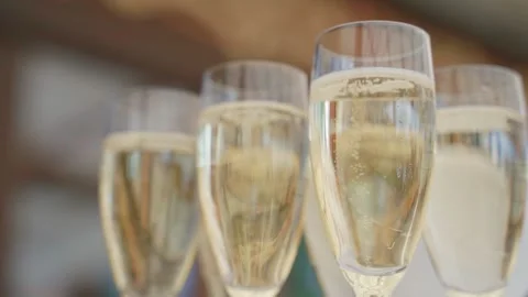 Glasses of champagne on the table Stock Footage 146243013