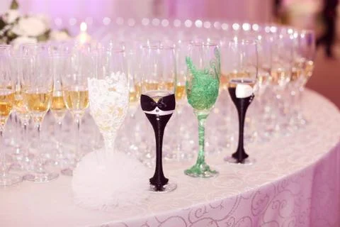 Glasses of champagne on table Stock Photos