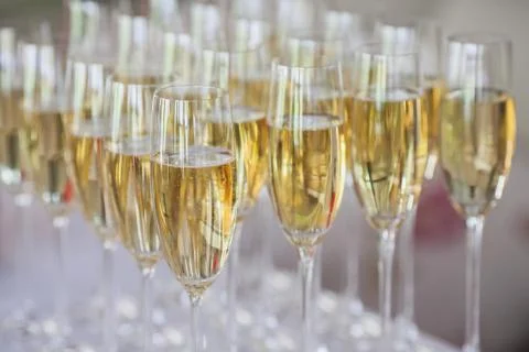 Glasses of champagne on the table Stock Photos