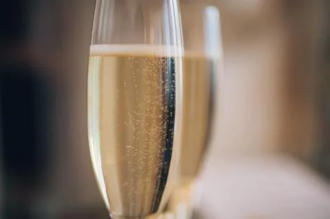 Glasses of champagne on the table Stock Photos